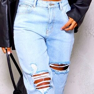 Light blue open knee rip hem mom jeans